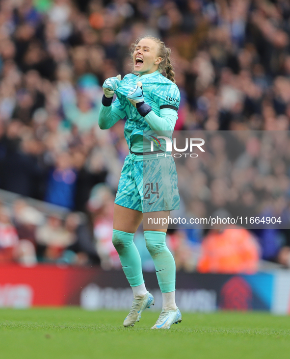 Chelsea goalkeeper Hannah Hampton celebrates in front of the Arsenal fans after the Barclays FA Women's Super League match between Arsenal a...