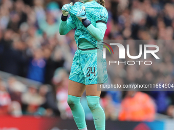 Chelsea goalkeeper Hannah Hampton celebrates in front of the Arsenal fans after the Barclays FA Women's Super League match between Arsenal a...