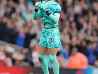 Chelsea goalkeeper Hannah Hampton celebrates in front of the Arsenal fans after the Barclays FA Women's Super League match between Arsenal a...