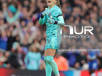 Chelsea goalkeeper Hannah Hampton celebrates in front of the Arsenal fans after the Barclays FA Women's Super League match between Arsenal a...