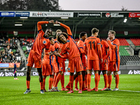 Netherlands players Emmanuel Emegha and Gjivaj Zechiel celebrate a goal during the Netherlands U21 vs. Sweden U21 match at the Goffertstadio...