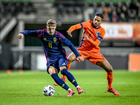 Sweden player Jacob Ondrejka and Netherlands player Devyne Rensch participate in the match between Netherlands U21 and Sweden U21 at the Gof...