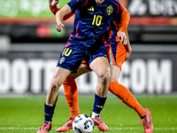 Sweden player Williot Swedberg and Netherlands player Rav van den Berg participate in the match between Netherlands U21 and Sweden U21 at th...