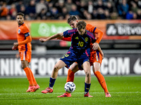 Sweden player Williot Swedberg and Netherlands player Rav van den Berg participate in the match between Netherlands U21 and Sweden U21 at th...