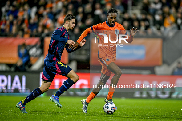 Sweden player Noah Eile and Netherlands player Emmanuel Emegha participate in the match between Netherlands U21 and Sweden U21 at the Goffer...