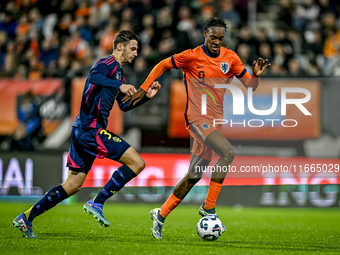 Sweden player Noah Eile and Netherlands player Emmanuel Emegha participate in the match between Netherlands U21 and Sweden U21 at the Goffer...