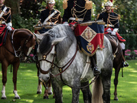 The garden of the Hotel de Matignon welcomes the Belgian sovereigns, King Philippe and Queen Mathilde, who are greeted by Premier Michel Bar...