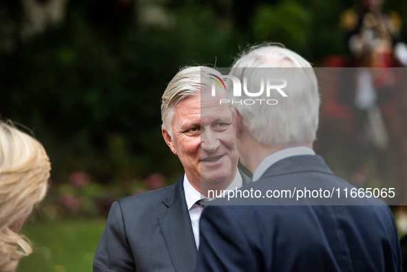 King Philip of the Belgians and Queen Mathilde are welcomed by Premier Michel Barnier and his wife Isabelle Altamayer in Paris, France, on O...