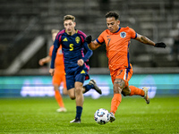 Sweden player Jonas Rouhi and Netherlands player Million Manhoef participate in the match between Netherlands U21 and Sweden U21 at the Goff...