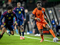 Sweden player Ahmed Qasem and Netherlands player Ezechiel Banzuzi participate in the match between Netherlands U21 and Sweden U21 at the Gof...