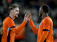 Netherlands player Kenneth Taylor and Netherlands player Neraysho Kasanwirjo celebrate the 3-0 goal during the Netherlands U21 vs. Sweden U2...