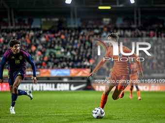 Sweden player Ahmed Qasem and Netherlands player Ruben van Bommel participate in the match between Netherlands U21 and Sweden U21 at the Gof...