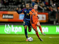 Sweden player Amar Fatah and Netherlands player Kenneth Taylor participate in the match between Netherlands U21 and Sweden U21 at the Goffer...