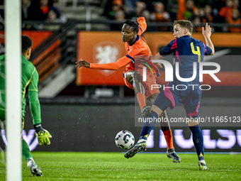 Netherlands player Emmanuel Emegha and Sweden player Casper Widell participate in the match between Netherlands U21 and Sweden U21 at the Go...