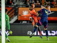 Netherlands player Emmanuel Emegha and Sweden player Casper Widell participate in the match between Netherlands U21 and Sweden U21 at the Go...