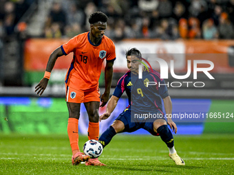 Netherlands player Ezechiel Banzuzi and Sweden player Jusef Erabi participate in the match between Netherlands U21 and Sweden U21 at the Gof...