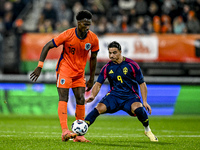 Netherlands player Ezechiel Banzuzi and Sweden player Jusef Erabi participate in the match between Netherlands U21 and Sweden U21 at the Gof...