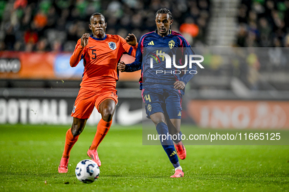 Netherlands player Neraysho Kasanwirjo and Sweden player Amar Fatah participate in the match between Netherlands U21 and Sweden U21 at the G...