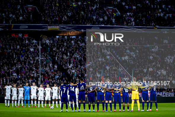 A minute of silence for Johan Neeskens takes place during the match between Germany and the Netherlands at the Allianz Arena for the UEFA Na...