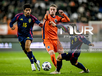 Sweden player Ahmed Qasem, Netherlands player Kenneth Taylor, and Sweden player Samuel Dahl are present during the match between Netherlands...