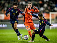 Sweden player Ahmed Qasem, Netherlands player Kenneth Taylor, and Sweden player Samuel Dahl are present during the match between Netherlands...