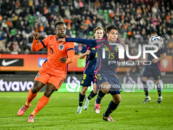 Netherlands player Noah Ohio and Sweden player Matteo Perez Vinlof participate in the match between Netherlands U21 and Sweden U21 at the Go...