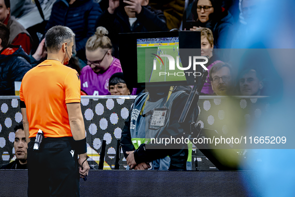 Referee Slavko Vincic checks VAR during the match between Germany and the Netherlands at the Allianz Arena for the UEFA Nations League, Leag...