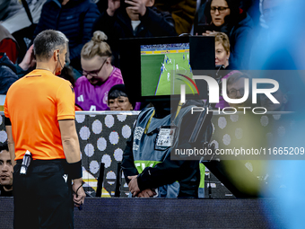 Referee Slavko Vincic checks VAR during the match between Germany and the Netherlands at the Allianz Arena for the UEFA Nations League, Leag...