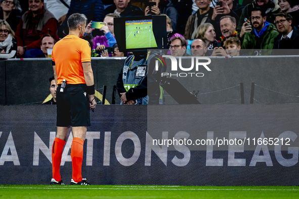 Referee Slavko Vincic checks VAR during the match between Germany and the Netherlands at the Allianz Arena for the UEFA Nations League, Leag...