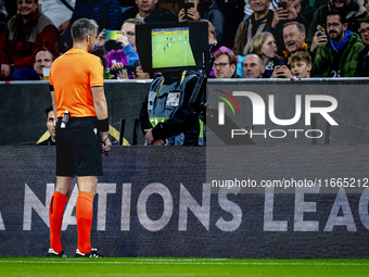 Referee Slavko Vincic checks VAR during the match between Germany and the Netherlands at the Allianz Arena for the UEFA Nations League, Leag...