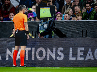 Referee Slavko Vincic checks VAR during the match between Germany and the Netherlands at the Allianz Arena for the UEFA Nations League, Leag...