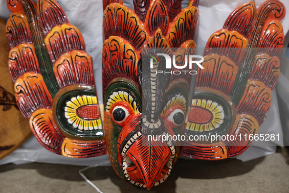 Traditional Sri Lankan wooden masks are in Markham, Ontario, Canada, on October 5, 2024. At a time when people worship trees and animals, ma...