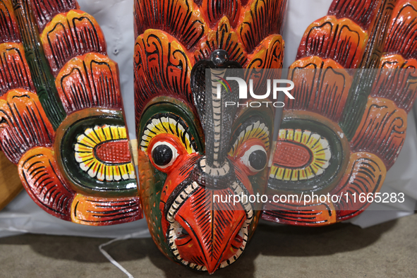 Traditional Sri Lankan wooden masks are in Markham, Ontario, Canada, on October 5, 2024. At a time when people worship trees and animals, ma...