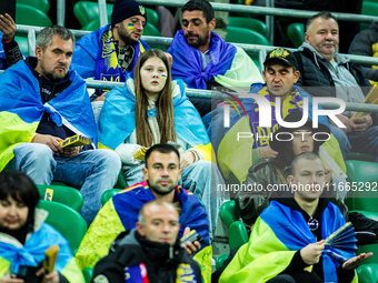 Ukraine fans attend a football match of the UEFA Nations League between the Ukraine and Czechia national teams in Wroclaw, Poland, on Octobe...