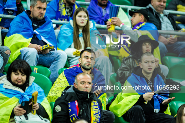 Ukraine fans attend a football match of the UEFA Nations League between the Ukraine and Czechia national teams in Wroclaw, Poland, on Octobe...