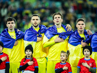 The Ukraine team plays during a football match of the UEFA Nations League between the Ukraine and Czechia national teams in Wroclaw, Poland,...