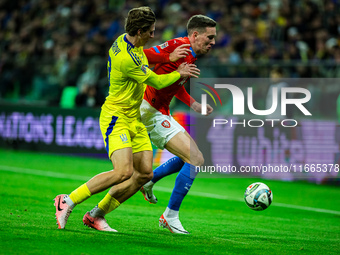 ILLIA ZABARDNYI AND JAN CERNY participate in a football match of the UEFA Nations League between the Ukraine and Czechia national teams in W...