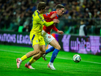 ILLIA ZABARDNYI AND JAN CERNY participate in a football match of the UEFA Nations League between the Ukraine and Czechia national teams in W...