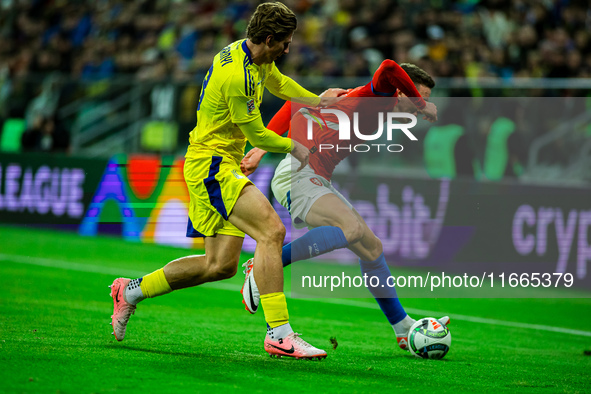 ILLIA ZABARDNYI AND JAN CERNY participate in a football match of the UEFA Nations League between the Ukraine and Czechia national teams in W...