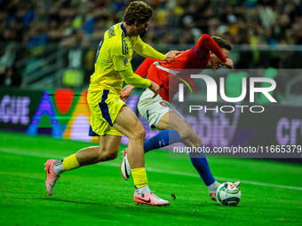 ILLIA ZABARDNYI AND JAN CERNY participate in a football match of the UEFA Nations League between the Ukraine and Czechia national teams in W...