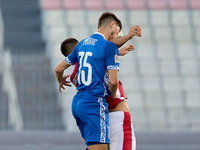 Victor Mudrac of Moldova vies for the ball with Luke Montebello of Malta during the UEFA Nations League, League D, Group D2 soccer match bet...