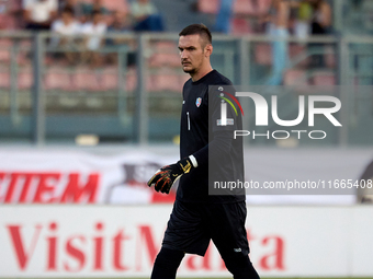 In Ta' Qali, Malta, on October 13, 2024, Dumitru Celeadnic, the goalkeeper of Moldova, participates in the UEFA Nations League, League D, Gr...