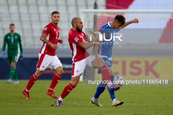 Mihail Caimacov of Moldova controls the ball despite the close challenge from Teddy Teuma of Malta during the UEFA Nations League, League D,...