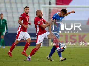 Mihail Caimacov of Moldova controls the ball despite the close challenge from Teddy Teuma of Malta during the UEFA Nations League, League D,...