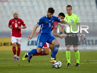 Victor Mudrac of Moldova vies for the ball with Luke Montebello of Malta during the UEFA Nations League, League D, Group D2 soccer match bet...