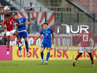 Paul Mbong of Malta vies for the ball with Mihail Caimacov of Moldova during the UEFA Nations League, League D, Group D2 soccer match betwee...