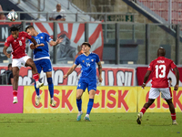 Paul Mbong of Malta vies for the ball with Mihail Caimacov of Moldova during the UEFA Nations League, League D, Group D2 soccer match betwee...