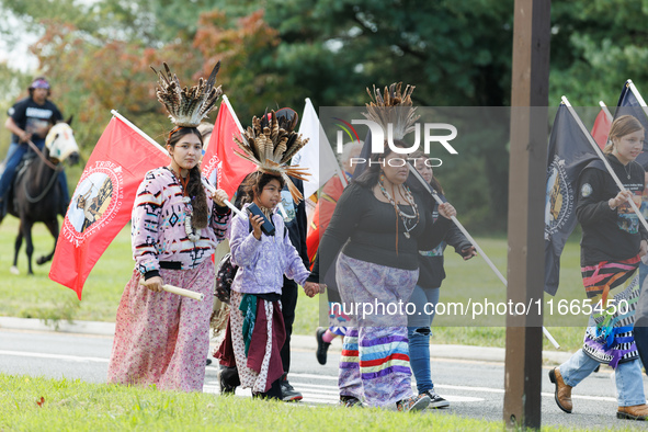 Members of the Muwekma Ohlone Tribe of the San Francisco Bay Area, along with other tribal groups and their supporters, arrive in Washington...