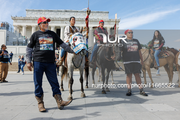 Members of the Muwekma Ohlone Tribe of the San Francisco Bay Area, along with other tribal groups and their supporters, arrive at the Lincol...