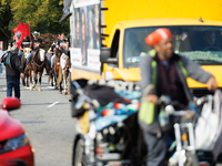 Members of the Muwekma Ohlone Tribe of the San Francisco Bay Area, along with other tribal groups and their supporters, cross the Arlington...